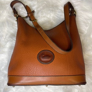 Vintage Dooney and Bourke All Weather Tan Pebbled Leather Hobo Bag