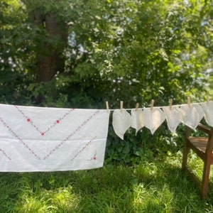 Vintage Hand Embroidered Table Cloth with a Running Floral Pattern and Six Napkins