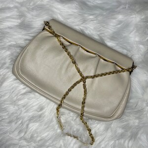 Monedero vintage de piel de hueso Etra con cadena dorada