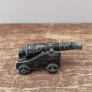 Vintage Cast Iron Penncraft Miniature Cannon with Moveable Muzzle