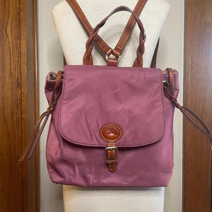 Dooney and Bourke Rose Colored Nylon Backpack with Leather Straps