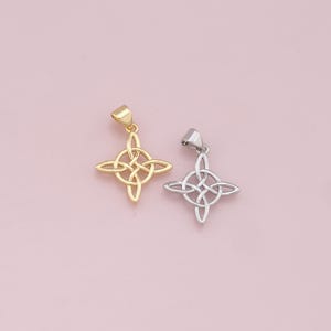 May include: Two Celtic knot pendants, one gold and one silver, in the shape of a four-pointed star.
