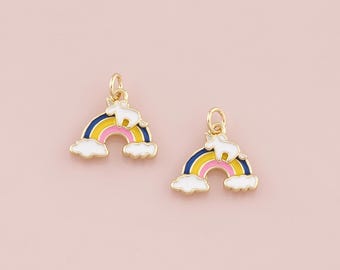May include: Two gold-tone charms featuring a white unicorn on a rainbow with white clouds. The rainbow is yellow, pink, and blue.