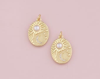 May include: Two gold-tone pendants with a sun and moon design. Each pendant features a pearl-like bead and small clear rhinestones.