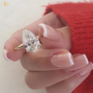 4.50 CT Pear Cut Lab Grown Diamond Engagement Ring: Art Deco Hidden Halo