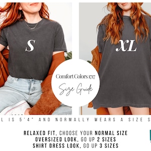 May include: Size guide for a dark gray t-shirt with the text "Comfort Colors 1717" and "Size Guide". The model is wearing a size small t-shirt and a size XL t-shirt. The text "S" and "XL" are printed on the shirts. The text "MODEL IS 5'4" AND NORMALLY WEARS A SIZE SMALL" is printed below the image. The text "RELAXED FIT, CHOOSE YOUR NORMAL SIZE", "OVERSIZED LOOK, GO UP 2 SIZES", and "SHIRT DRESS LOOK, GO UP 3 SIZES" is printed below the size guide. The text "Lilio CREATIONS." is printed in the bottom right corner of the image.