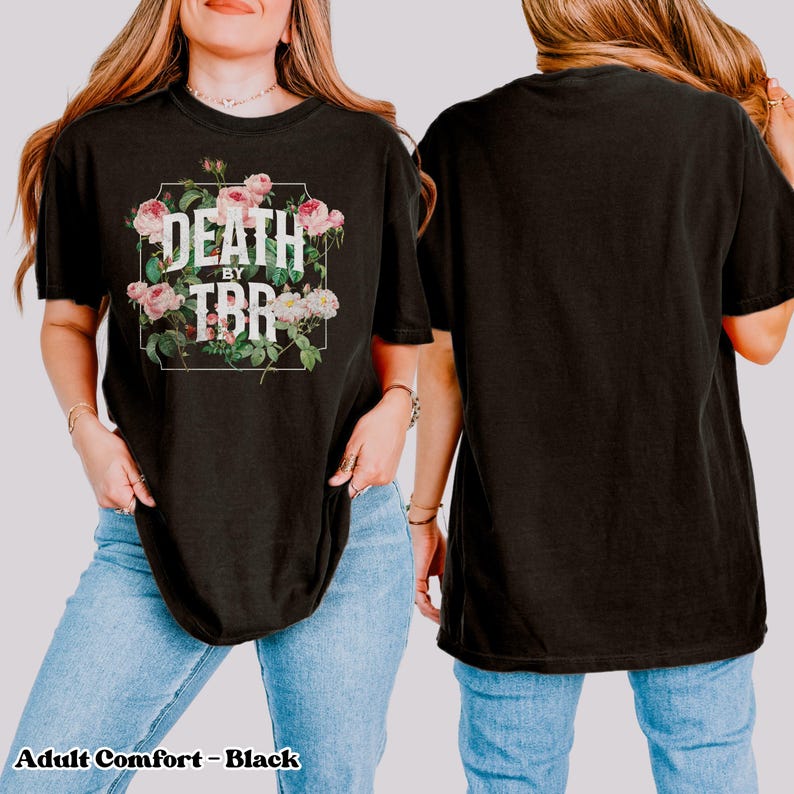 May include: Black t-shirt with a floral design and the text "Death by TBR" in a white rectangle.