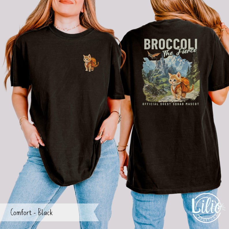 May include: Two black t-shirts, one with a cartoon cat wearing a backpack and the other with a cartoon cat wearing a backpack and the text "Broccoli The Fierce Official Quest Squad Mascot".