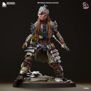 May include: A detailed figurine of a female character wearing a blue and green outfit with a helmet and holding a weapon. The figurine is standing on a rocky base.