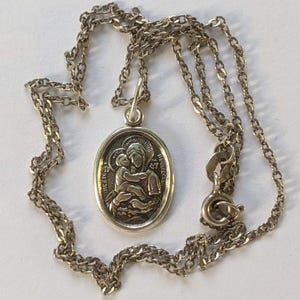 Pendant with the Pochaev Icon of the Mother of God made of 925 silver. Orthodox religious pendant