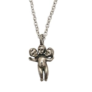 Tiny Baby Doll Necklace with Three Heads        silver  gold jewelry oddity