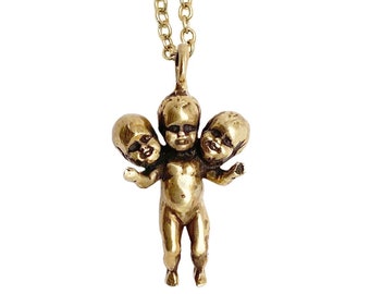 Baby Doll Halskette mit drei Köpfen gold silber Schmuck Kuriosität