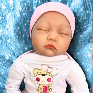 22&quot; Reborn Baby Doll: Realistic Soft Silicone Vinyl, Hand-Rooted Hair