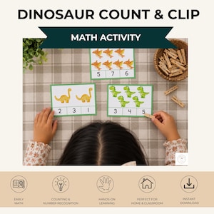 May include: Dinosaur Count & Clip math activity cards featuring watercolor illustrations of dinosaurs. The set includes rectangular cards with numbers and corresponding dinosaur counts, paired with wooden clothespins for clipping.