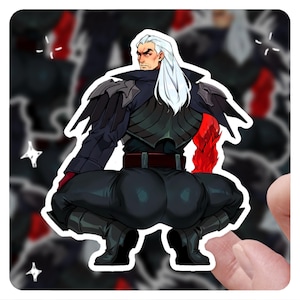 Puede incluir: Una pegatina con una ilustración estilizada de un personaje con cabello blanco, vistiendo una armadura negra con detalles rojos. El personaje está en cuclillas. La pegatina tiene un borde blanco y está sujeta por una mano.