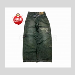 Retro Baggy Jeans,Y2K Denim Pants,Hip Hop Outfit,Wide Street Pants,Harajuku Denim,Gothic Baggy Fit,Cool Retro Look,Unisex Streetwear,Trendy Blue Jeans,Loose Denim Fit,Urban Baggy Jeans,Casual Y2K Style,Embroidered Pants
