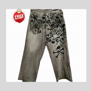 Retro Baggy Jeans,Y2K Denim Pants,Hip Hop Outfit,Wide Street Pants,Harajuku Denim,Gothic Baggy Fit,Cool Retro Look,Unisex Streetwear,Trendy Blue Jeans,Loose Denim Fit,Urban Baggy Jeans,Casual Y2K Style,Embroidered Pants