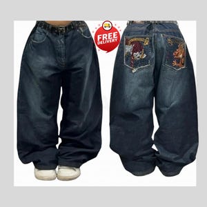 Retro Baggy Jeans,Y2K Denim Pants,Hip Hop Outfit,Wide Street Pants,Harajuku Denim,Gothic Baggy Fit,Cool Retro Look,Unisex Streetwear,Trendy Blue Jeans,Loose Denim Fit,Urban Baggy Jeans,Casual Y2K Style,Embroidered Pants