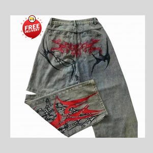 Retro Baggy Jeans,Y2K Denim Pants,Hip Hop Outfit,Wide Street Pants,Harajuku Denim,Gothic Baggy Fit,Cool Retro Look,Unisex Streetwear,Trendy Blue Jeans,Loose Denim Fit,Urban Baggy Jeans,Casual Y2K Style,Embroidered Pants