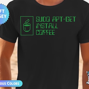 May include: Black t-shirt with green text that reads "sudo apt-get install coffee" and a green icon of a coffee cup.