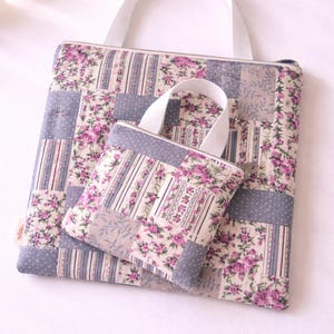 May include: A set of three ceramic mugs with a speckled, matte finish. The mugs are in shades of cream, light gray, and dark gray. Each mug has a simple, minimalist design, perfect for coffee or tea.