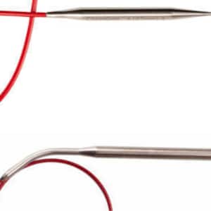 May include: Close-up of two circular knitting needles. The needles are silver-colored with a red cable connecting them. The needles are made of metal and have pointed tips. The cable is flexible and allows for easy manipulation of the needles.
