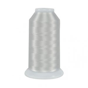 May include: A spool of silver thread for sewing or embroidery.