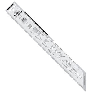 May include: A clear plastic ruler with a gray bias binding simplified guide. The ruler has markings in inches and includes instructions for bias binding with illustrations.