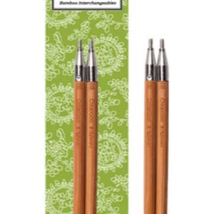 May include: A pair of bamboo interchangeable knitting needles with a green and white patterned background. The needles are labeled "ChiaoGoo 3.50 mm (US 4)".