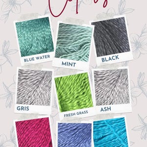 May include: A color chart with yarn samples in various colors, including blue water, mint, black, gris, fresh grass, ash, current, blue jeans, and light turquoise. The chart is labeled "Colors".