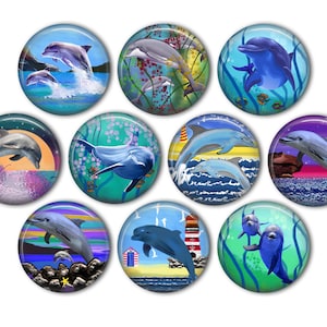 May include: Ten round, colorful buttons with images of dolphins jumping out of the water. The buttons have a variety of backgrounds, including blue, green, purple, and yellow. Some buttons feature multiple dolphins, while others feature a single dolphin.
