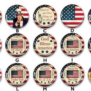 May include: A set of 15 round, glossy, patriotic buttons with various American flag designs and patriotic sayings. The buttons feature red, white, and blue colors with gold accents. The sayings include "United We Stand", "Land of the Free", "God Bless America", "Proud To Be An American", "My Home Sweet Home", "Liberty & Justice For All", "One Nation Under God", "Happy 4th of July", "Hooray For The USA", and "We The People".