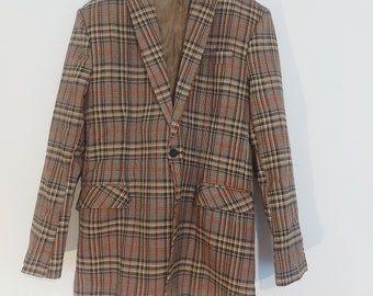 May include: A brown, orange, and black plaid blazer with a single button closure.