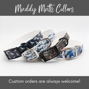 May include: A collection of dog collars with various patterns, including sharks, butterflies, and ocean waves. Each collar has a white interior and a metal buckle. The collars are displayed on a white background. The text "Muddy Mutts Collars" is at the top.