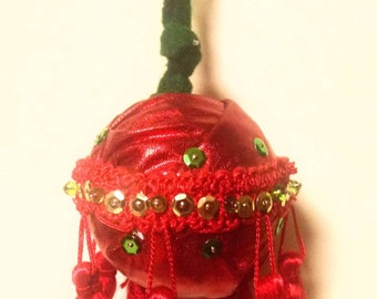 Styrofoam Ball Ornament. Shiny Red Fabric With Fringe.