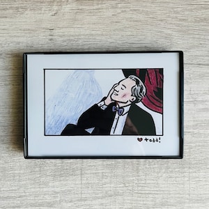 May include: A framed illustration of a man in a tuxedo with a bow tie, smiling and looking to the side. The background is a blue and red gradient. The image is signed "todd!" in the bottom right corner.