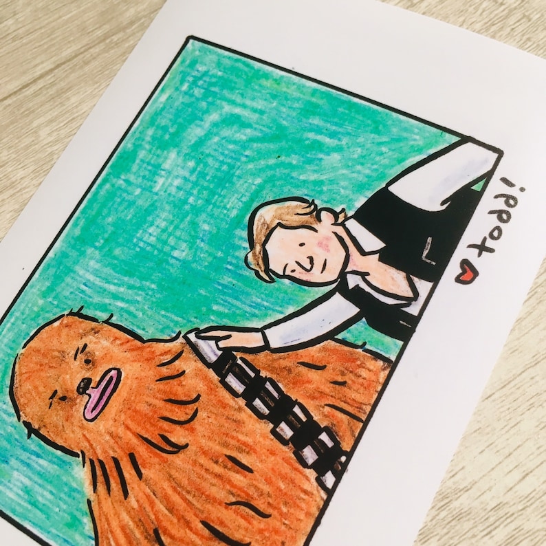 May include: A hand-drawn illustration of Han Solo from Star Wars, with a brown and orange Wookiee character, Chewbacca, in the background. Han Solo is wearing his signature vest and has a light brown hair color. The illustration is in a polaroid frame with a heart and the word "Todd!" written in the corner.