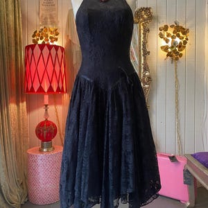 80s goth prom dress Living out my 80's goth fantasy in this black and blue ensemble This insane 80's prom dress has everything you could ask for: lace, polka dots, ruffles, sparkle, and a big