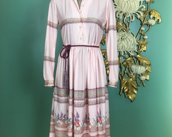 1970s shirtwaist dress, vintage 70s dress, pink polyester, braided rope, border print floral, medium, secretary, button up, secretary, full