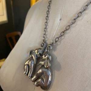 1970s necklace, novelty, double elephants, vintage jewelry, animals, silver tone, chunky pendant, good luck charm, late 60s, mod, funky image 4