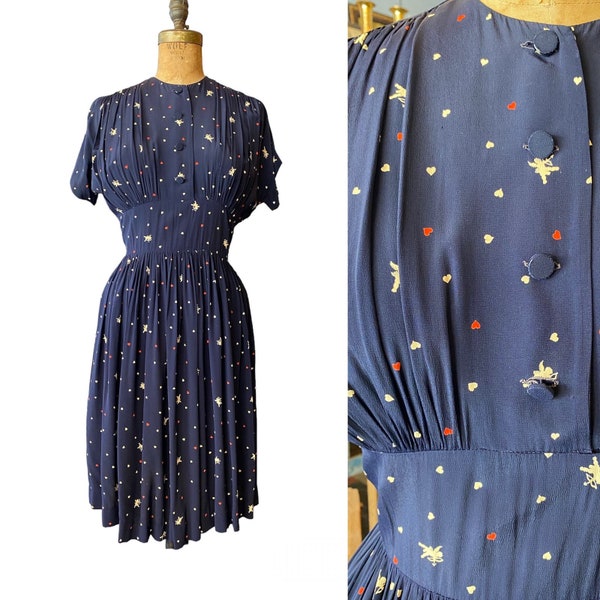 1940s novelty print dress, cupids and hearts, navy blue rayon, vintage 40s dress, m/l, rockabilly, dolman sleeves, film noir, 29 30 waist