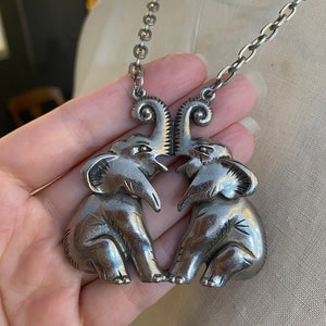 1970s necklace, novelty, double elephants, vintage jewelry, animals, silver tone, chunky pendant, good luck charm, late 60s, mod, funky image 5