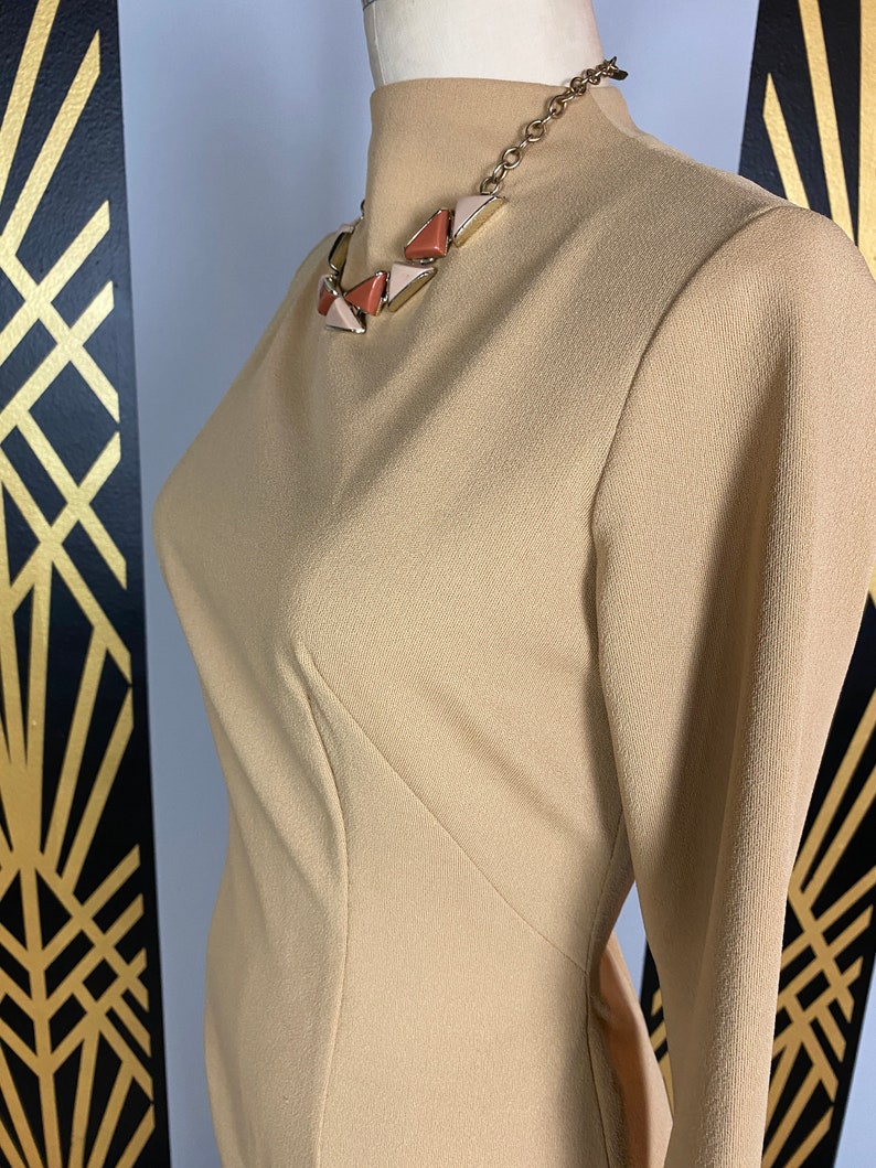 1960s wiggle dress, tan polyester, slim fit, vintage 60s dress, hourglass dress, long sleeve, size medium, simple, classic, high neck, 28 image 6
