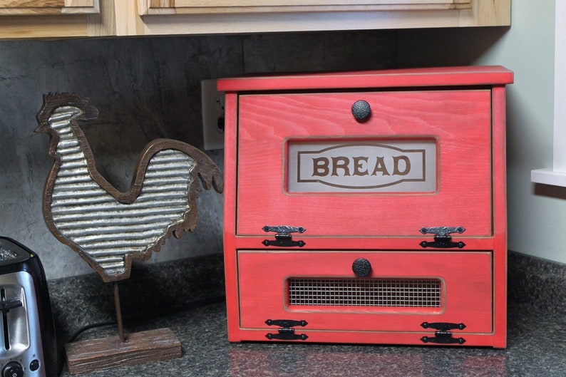 This D-LIGHTFUL DESIGNS ORIGINAL, beautiful Bread box / Vegetable bin is made from Pine or Spruce wood.  Each one is handmade by my husband and each will be a bit different due to wood grain and natural knots and flaws.
RUSTIC RED