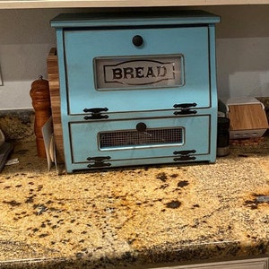 This D-LIGHTFUL DESIGNS ORIGINAL, beautiful Bread box / Vegetable bin is made from Pine or Spruce wood.  Each one is handmade by my husband and each will be a bit different due to wood grain and natural knots and flaws.
RUSTIC TURQUOISE