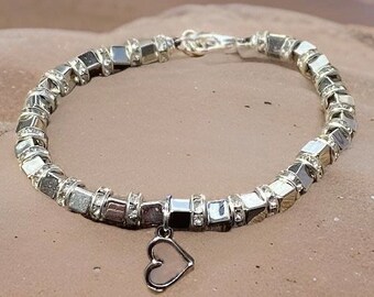 Silver plated bracelet with hanging charm