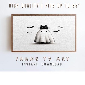 May include: A framed print featuring a whimsical illustration of a ghost with a black cat on its head, surrounded by bats. The artwork is in black and white, with the text "HIGH QUALITY | FITS UP TO 85" and "FRAME TV ART INSTANT DOWNLOAD".