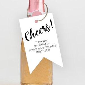 May include: A white tag with black text that reads "Cheers!"  Thank you for coming to Jessie's retirement party May 27, 20xx. The tag is attached to a small bottle of champagne.