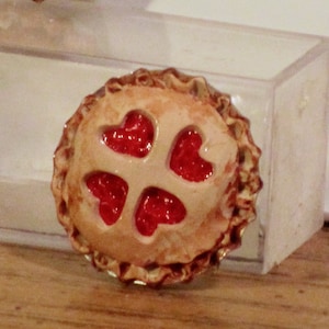 Miniature fancy Cherry pie with cut out crust