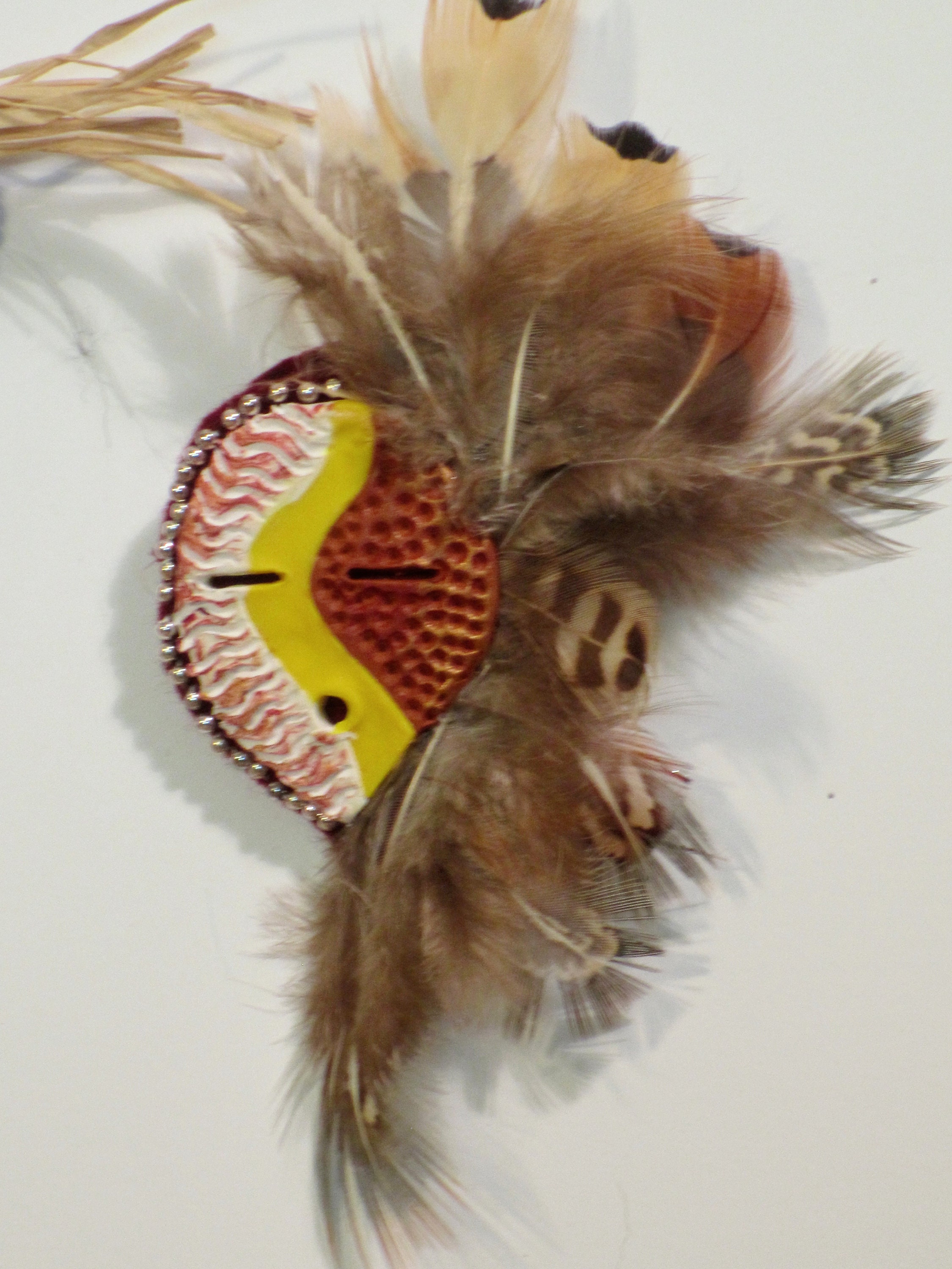 Tribal style Mask brooch/lapel pin with feathers